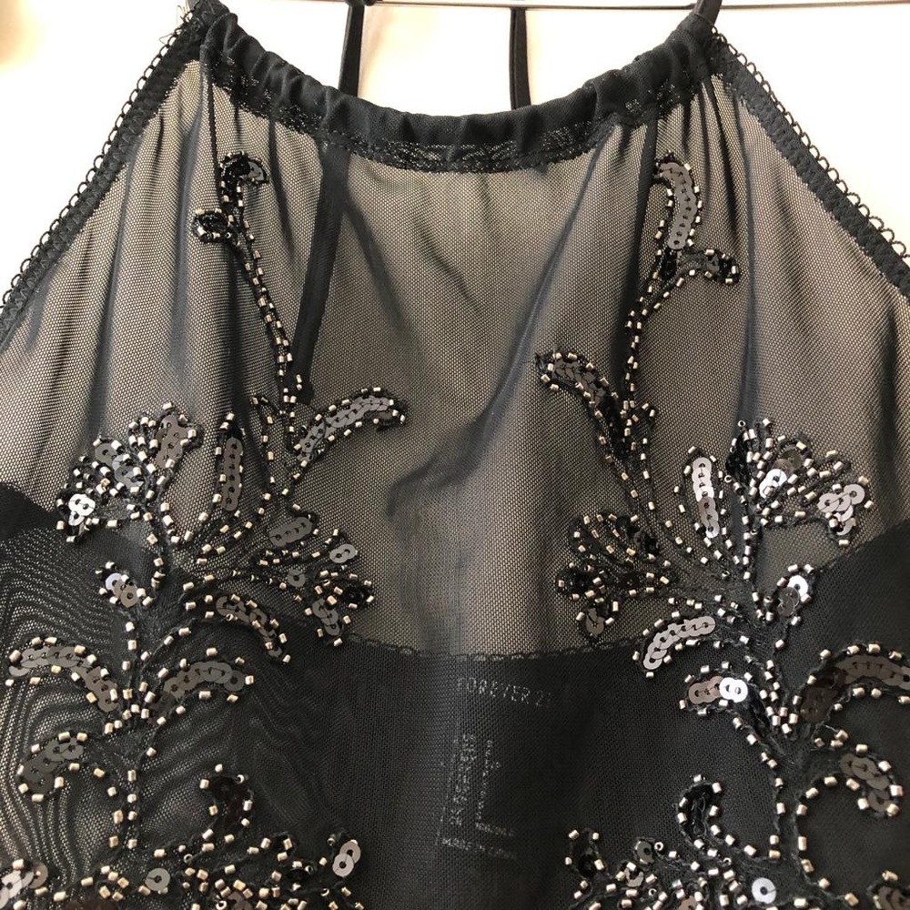 NWOT sheer and beautifully beaded bodysuit